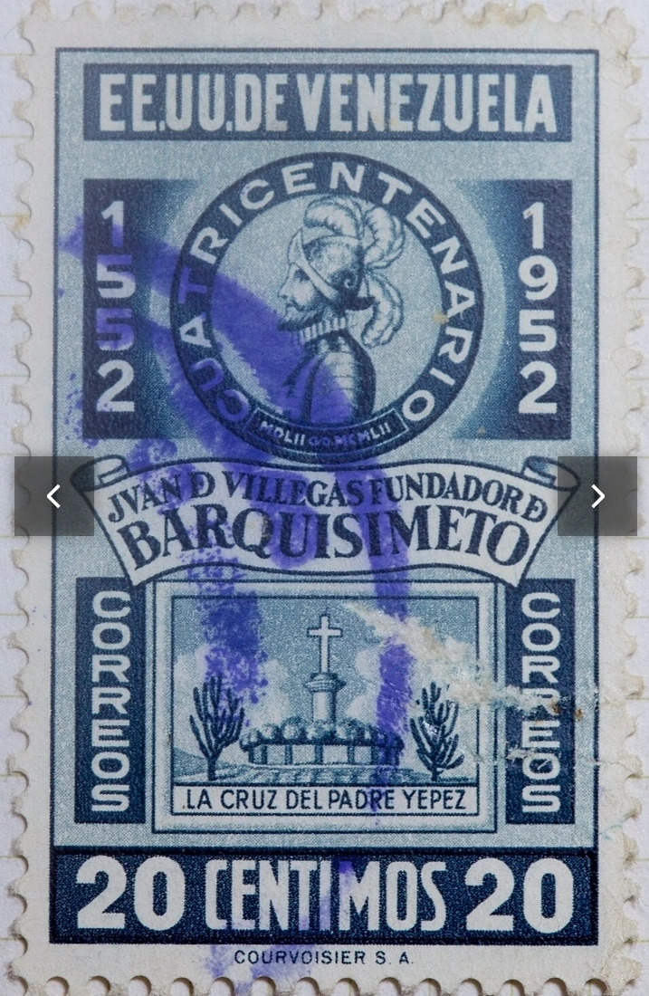 Estampilla conmemorativa al cuatri centenario de la fundación de Barquisimeto (1952-1952) e incluye la imagen de la Cruz del Padre Macario Yépez y el retrato del fundador Juan de Villegas en la parte superior. Impreso por Courvoisier S.A., valor 20 céntimos para la Dirección de Correos (Correos de Venezuela). CC. BY. 2.0. Colección de Mark Morgan.